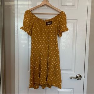 Mustard yellow polka dot mini dress